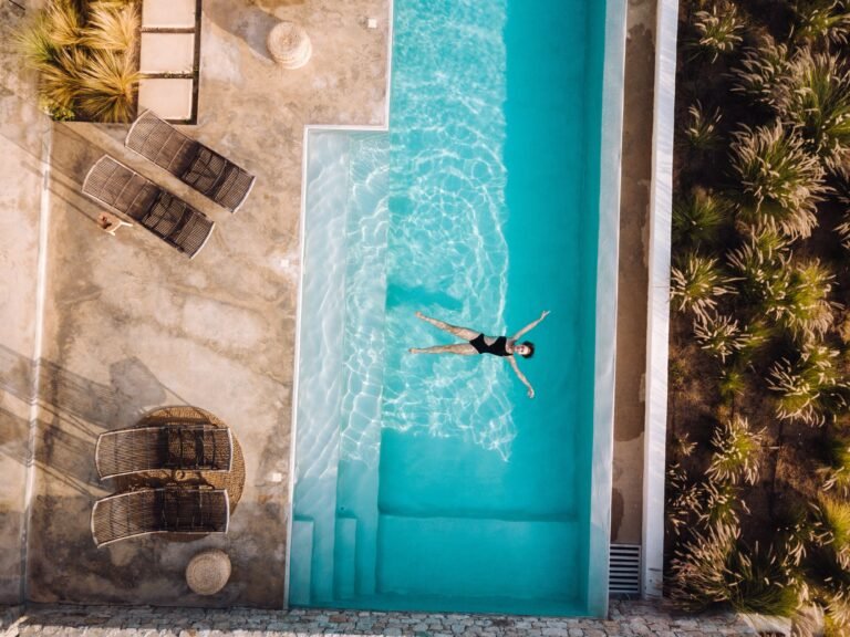 Aerial view of a private swimming pool at a luxury Mediterranean villa