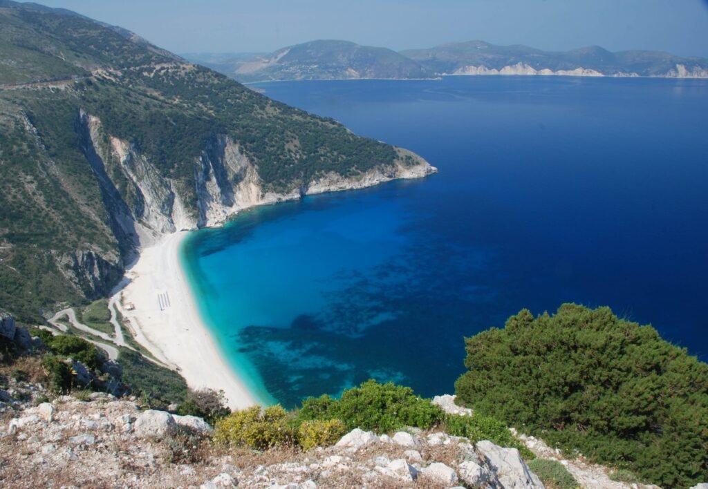 Myrtos Beach curving below the mountains on Kefalonia