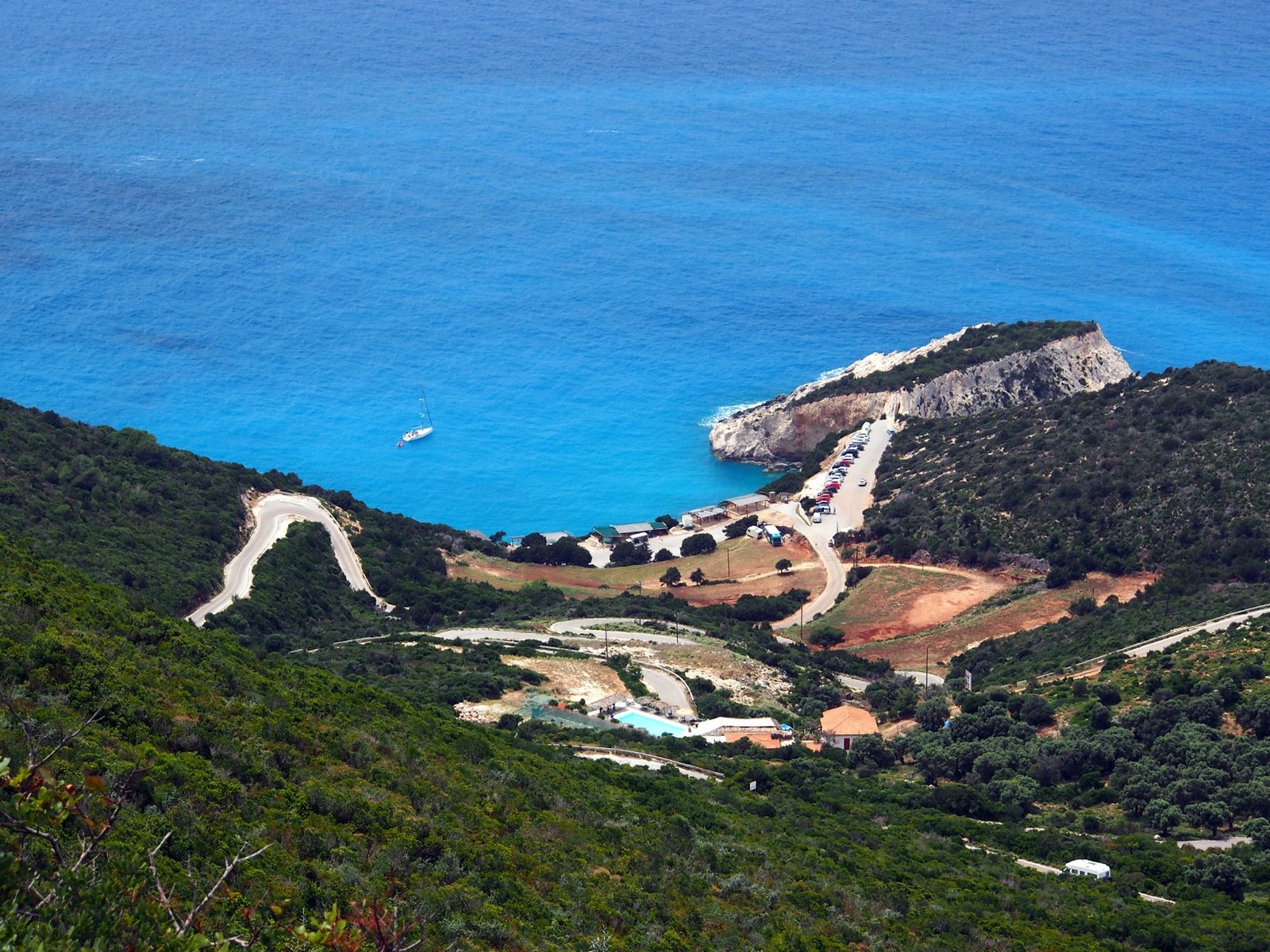 Porto Katsiki headland, winding approach road and turquoise Ionian water